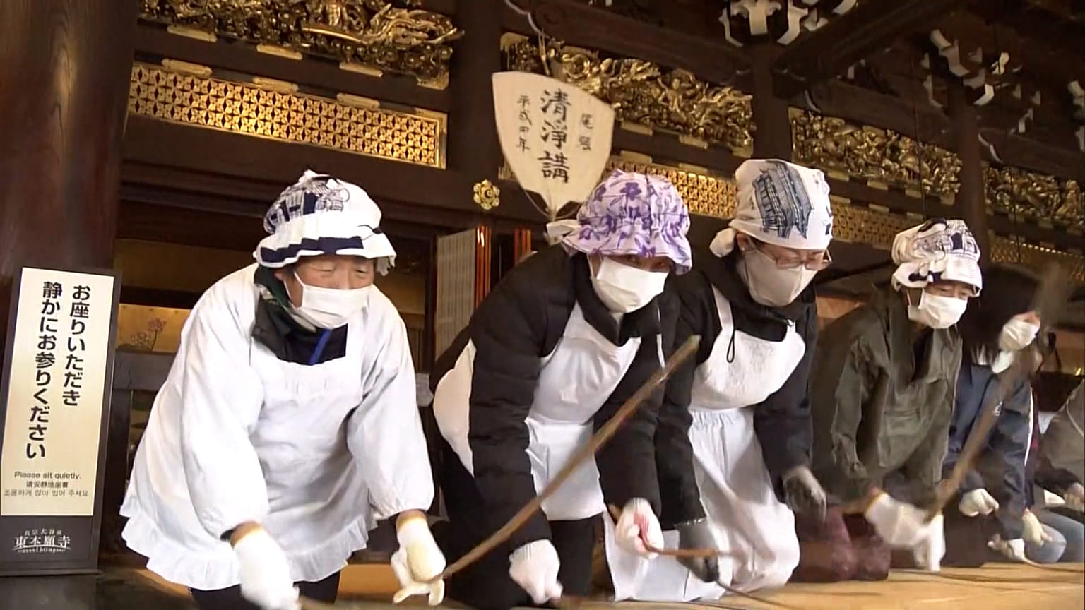 Hundreds of people have taken part in an annual year-end cleanup at two major temples in Kyoto, Japan, Dec.20, 2025