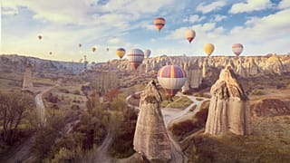 Cappadocia’s landscapes are enchanting year-round, but visiting in autumn means the chance to see the region’s iconic fairy chimneys and cave dwellings glow in the seasonal go