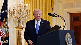 President Donald Trump arrives to speak during a Hanukkah reception in the East Room of the White House, Tuesday, Dec. 16, 2025, in Washington.