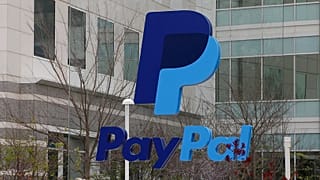 FILE - This March 10, 2015 photo shows a PayPal sign outside of the main entrance to an office building in San Jose, California.
