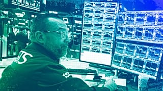 A specialist works on the floor of the New York Stock Exchange, 6 May 2025