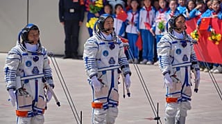 Chinese astronauts attend a send-off ceremony for the Shenzhou 20 space mission at the Jiuquan Satellite Launch Center in northwestern China, on April 24, 2025.