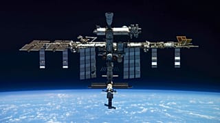 In this handout photo released by Roscosmos Space Agency Press Service, a view of the International Space Station taken on March 30, 2022. 