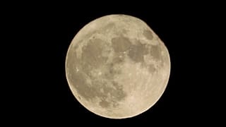 Supermoon as seen through arch in Pula amphitheatre. ARCHIVE: Pula, Croatia - 14 November 2016