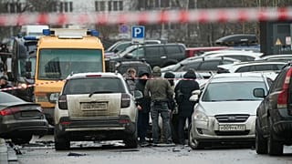 Investigators work the scene where Lt. Gen. Fanil Sarvarov, head of the Operational Training Directorate of the Russian Armed Forces General Staff, was killed by an explosive 