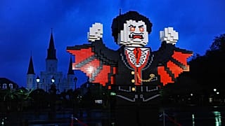 A giant vampire figure is completed in the early morning at the LEGO Halloween-themed community build on Sunday Sept 30, 2012, in New Orleans.