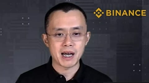 FILE - Binance CEO Changpeng Zhao answers a question during a Zoom meeting interview with The Associated Press on Nov. 16, 2021.