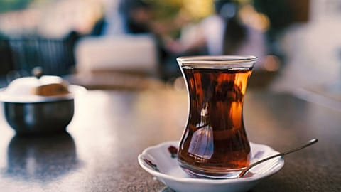 A cup of Turkish tea in a traditional ince belli (which literally translates to "slim-waisted") glass